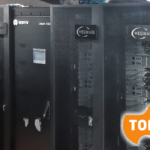 Frist part of the new cluster "Helma" in the NHR@FAU "Kältezentrale." Imn the right front corner is the logo of the "Top 500".